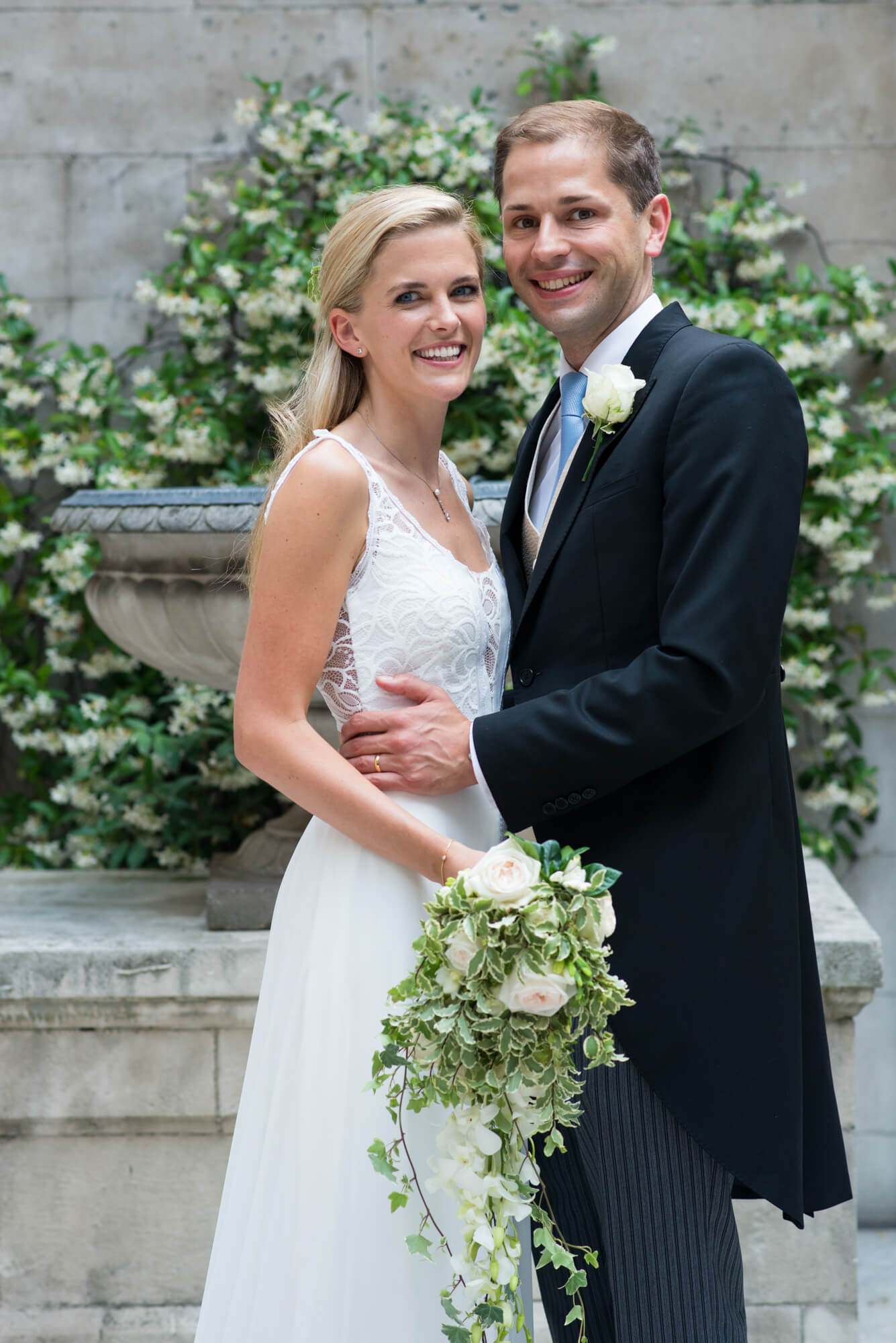 A bride and groom having their wedding photography at Dartmouth House in London